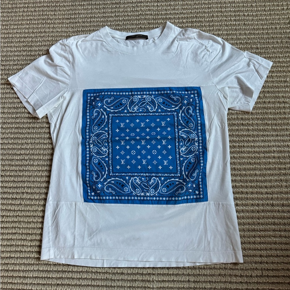 Vintage Louis Vuitton mixed logo graphic tee shirt. Back is solid white.